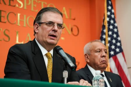 Mexico's Foreign Minister Marcelo Ebrard holds a news conference next to National Immigration Institute (INM) Commissioner Francisco Garduno following talks with members of the Trump administration in Washington