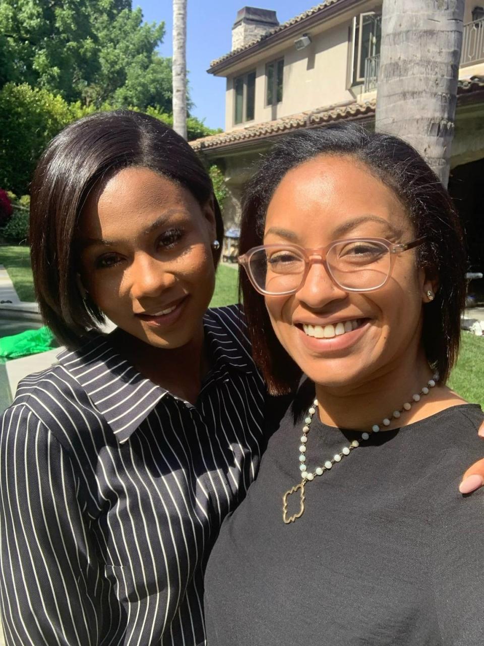 Natalia Temesgen, a Columbus State University associate professor of English, poses with actress Emayatzy Corinealdi on the set of the Hulu TV series “Reasonable Doubt” in May 2022 in Los Angeles. She is one of two executive story editors and among eight writers for the show.