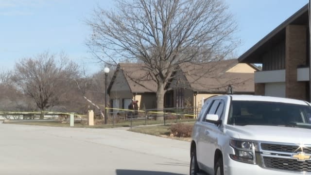 Authorities at the scene of a church where a priest was killed.