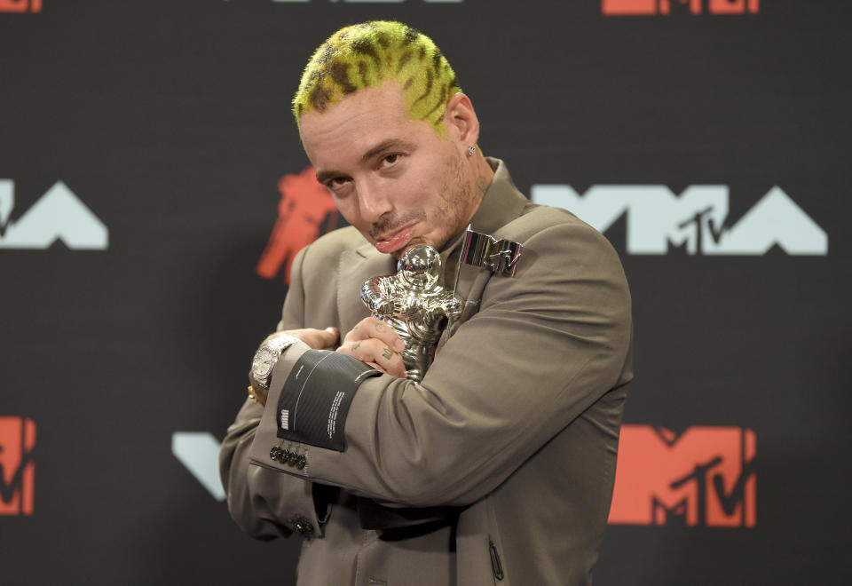 J Balvin poses in the press room with the award for best latin video for "Con Altura" at the MTV Video Music Awards at the Prudential Center on Monday, Aug. 26, 2019, in Newark, N.J. (Photo by Evan Agostini/Invision/AP)