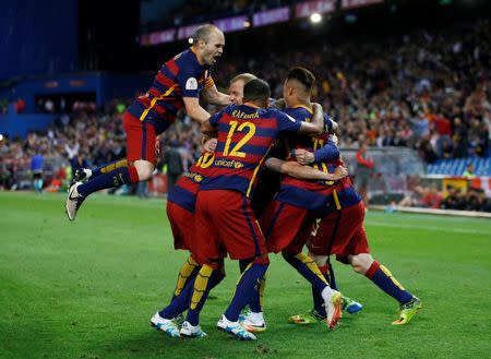 Soccer Football - FC Barcelona vs Sevilla - Copa del Rey Final - Vicente Calderon, Madrid, Spain - 22/5/16 Jordi Alba celebrates with team mates after scoring the first goal for Barcelona Reuters / Sergio Perez