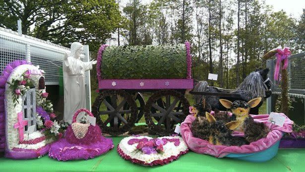 Over 60 wreaths were made into shapes of Ruby’s favourite things and floral tributes worth over AUD$32,000 were placed at Ruby's funeral. Photo: Wales Online