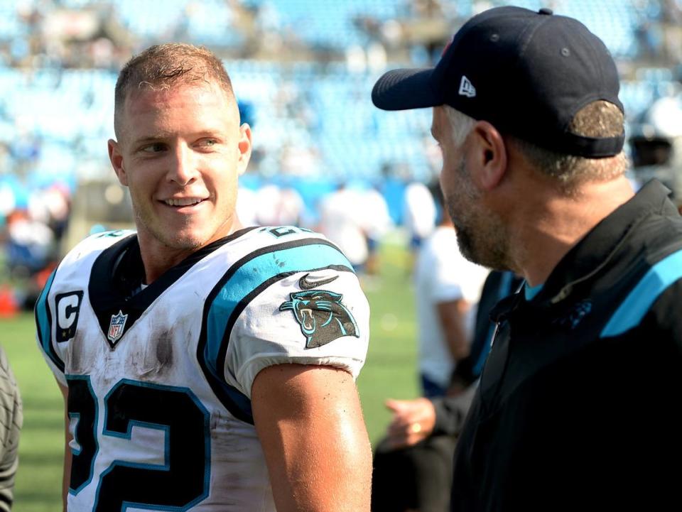 Carolina Panthers head coach Matt Rhule (right) said Tuesday he will likely hold Christian McCaffrey (left) out for all three of the 2022 preseason games, which is what he did last year as well.