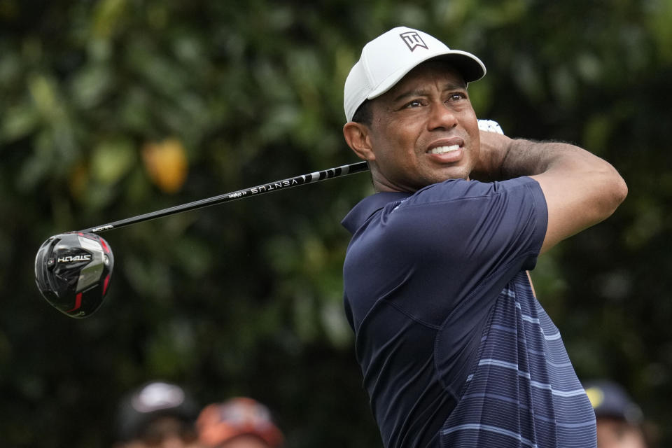 Tiger Woods watches his tee shot on the ninth hole during the second round of the Masters golf tournament at Augusta National Golf Club on Friday, April 7, 2023, in Augusta, Ga. (AP Photo/Mark Baker)