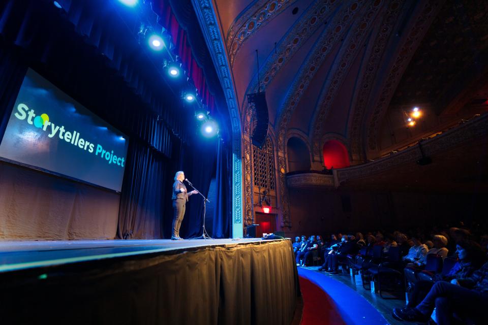 Stevie Lang tells her story during the Des Moines Storytellers Project's "Generosity" show at Hoyt Sherman Place in Des Moines on Tuesday, Dec. 13, 2022.