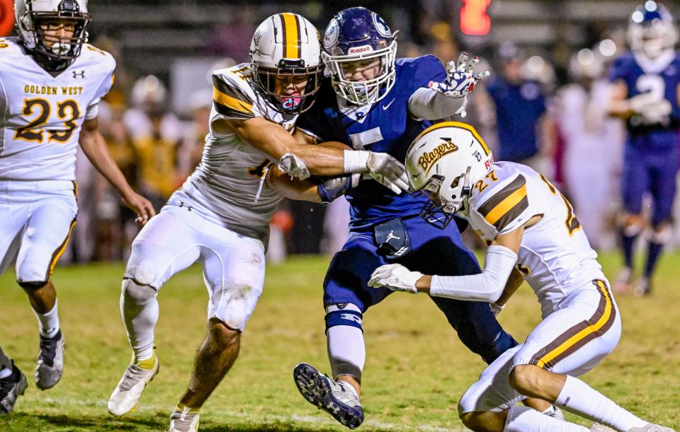 Redwood hosts Golden West in an East Yosemite League high school football game Friday, October 21, 2022. 