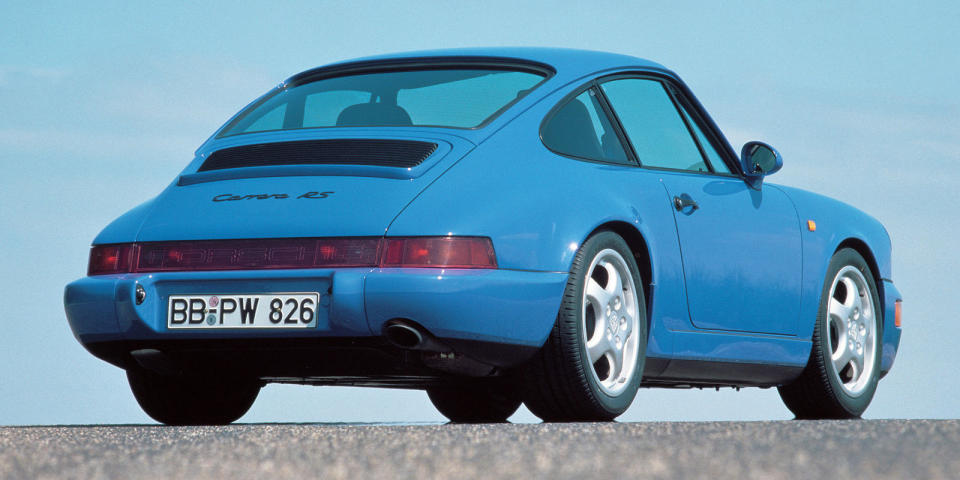 <p>Porsche's second 911 Carrera RS isn't as famous as the first, but it's a special car all the same. To create the 964 RS, Porsche cut out 360 lbs from the already-light Carrera 2 and boosted its 3.6-liter flat-six to 256 horsepower. Yes, we did get the RS America, but the Carrera RS is the real deal. It's a perfect early-1990s 911, but unfortunately, <a rel="nofollow noopener" href="http://www.roadandtrack.com/car-culture/buying-maintenance/news/a31004/porsche-964-carrera-rs-ngt/" target="_blank" data-ylk="slk:they're quickly becoming expensive collector's items;elm:context_link;itc:0;sec:content-canvas" class="link ">they're quickly becoming expensive collector's items</a>.</p>