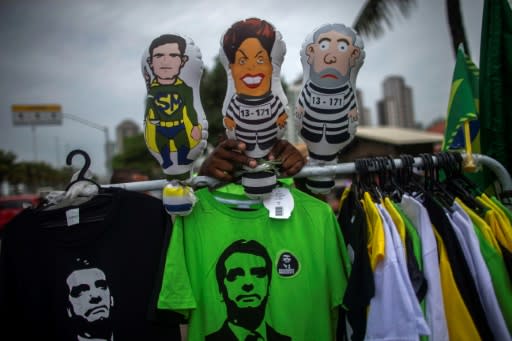 Brazilian president-elect Jair Bolsonaro, emblazoned on t-shirts pictured in Rio on November 1, 2018, has doubled down on his vow to roll back gun-control laws