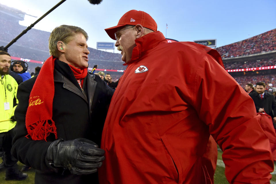 Kansas City Chiefs head coach Andy Reid, right, talks to Clark Hunt, part owner, Chairman and CEO of the Kansas City Chiefs, after the NFL AFC Championship football game against the Tennessee Titans Sunday, Jan. 19, 2020, in Kansas City, MO. The Chiefs won 35-24 to advance to Super Bowl 54. (AP Photo/Ed Zurga)