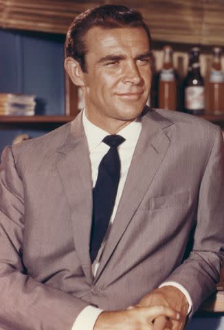 <p>Screen Archives/Getty</p> Sean Connery as James Bond in 'Dr. No'