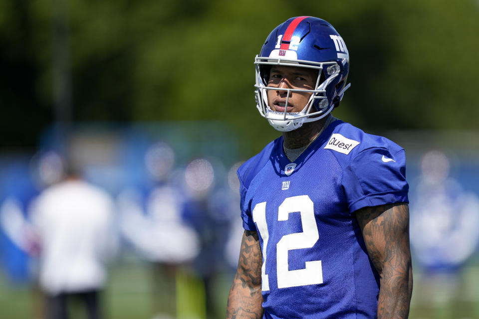 New York Giants tight end Darren Waller (12) stands on the sidelines during drills at the NFL football team's practice facility, Thursday, May 25, 2023, in East Rutherford, N.J. (AP Photo/John Minchillo)