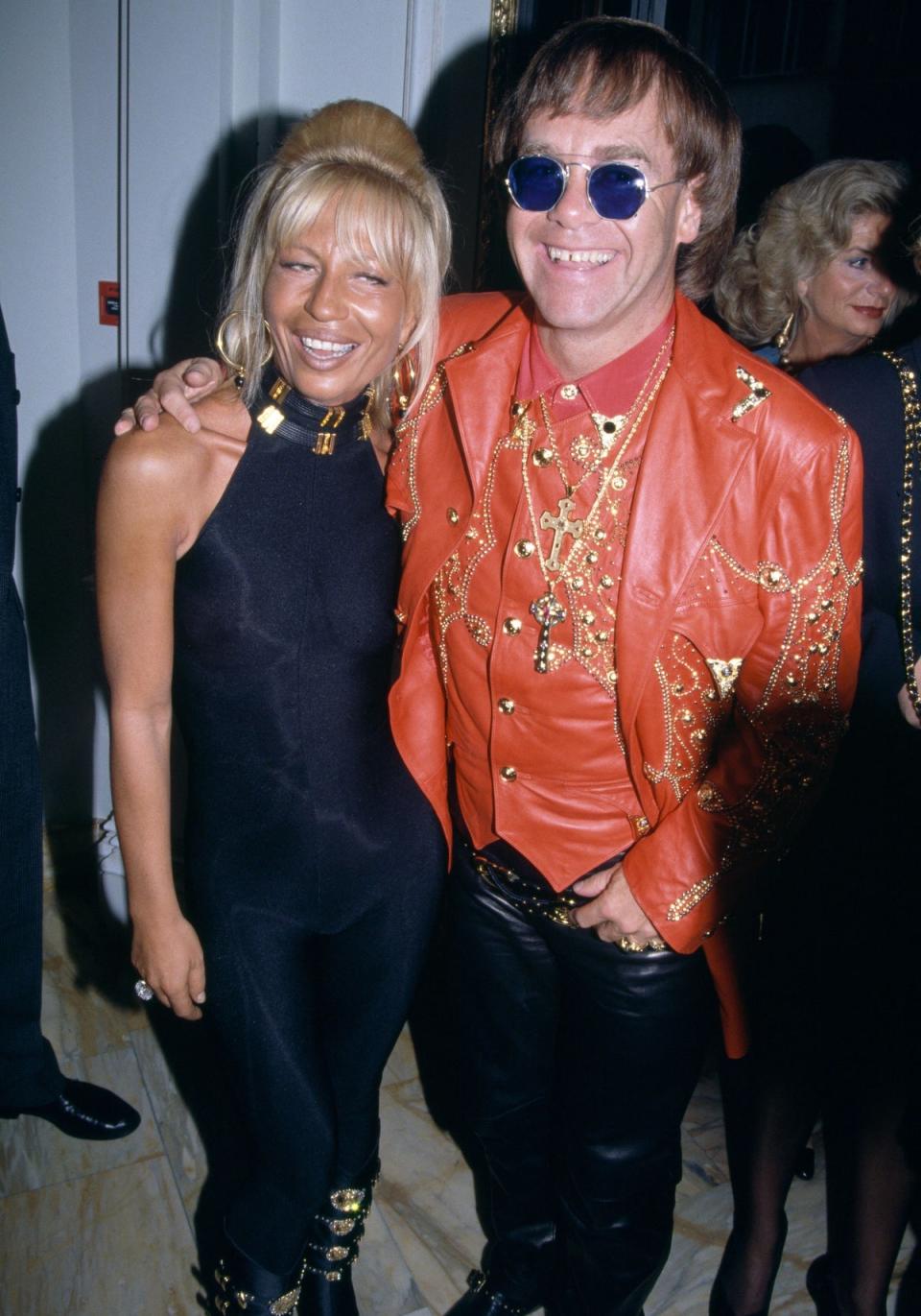 Elton John with Donatella Versace at the opening of the new Versace store in London, 1992 (Popperfoto via Getty Images)