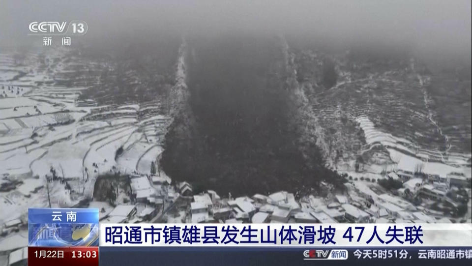 This image taken from video footage run by China's CCTV, shows an aerial view of the landslide in Liangshui village in southwestern China's Yunnan Province on Monday, Jan. 22, 2024. The landslide in southwestern China's mountainous Yunnan province early Monday buried dozens and forced the evacuation of hundreds. (CCTV via AP)