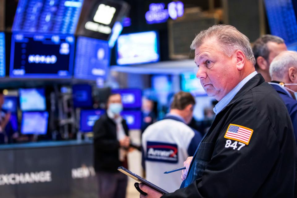 Traders work the floor at the New York Stock Exchange, Thursday, May 5, 2022 in New York. Stocks are slumping on Wall Street, erasing a rally from a day earlier, as markets assess the looming fallout from the Federal Reserve's stepped-up fight against inflation. (David L. Nemec/New York Stock Exchange via AP) ORG XMIT: NYBZ419