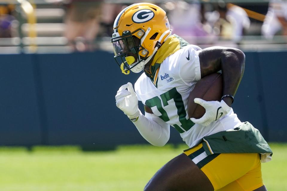 Green Bay Packers’ Patrick Taylor runs a drill at the NFL football team’s practice field Saturday, July 30, 2022, in Green Bay, Wis. (AP Photo/Morry Gash)