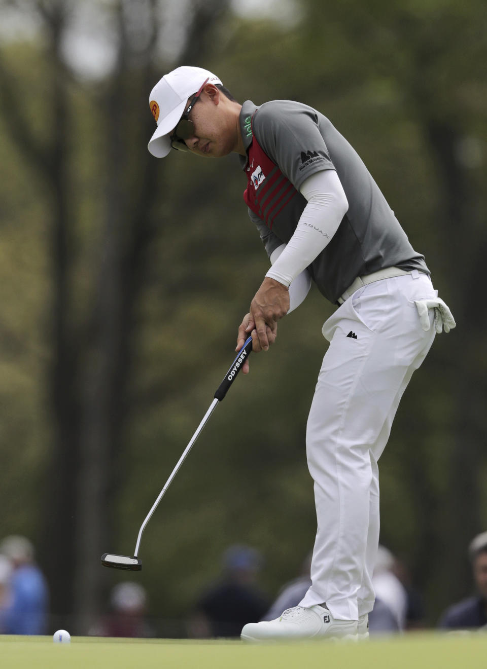 Jazz Janewattananond, of Thailand, putts on the 12th green during the second round of the PGA Championship golf tournament, Friday, May 17, 2019, at Bethpage Black in Farmingdale, N.Y. (AP Photo/Charles Krupa)