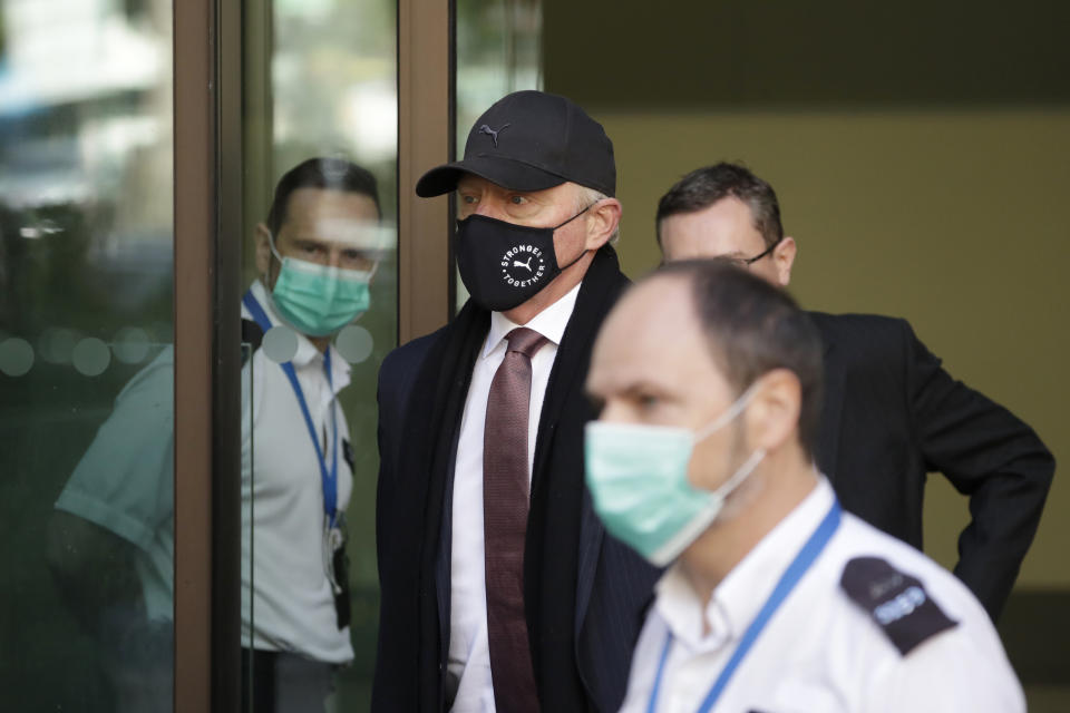 Retired German tennis player Boris Becker leaves Westminster Magistrates Court in London, after being declared bankrupt and accused of not complying with obligations to disclose information, Thursday, Sept. 24, 2020. Becker is being prosecuted by the Insolvency Service. (AP Photo/Matt Dunham)