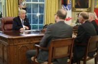 U.S. President Donald Trump (L) speaks during an interview with Reuters in the Oval Office of the White House in Washington, U.S., April 27, 2017. REUTERS/Carlos Barria