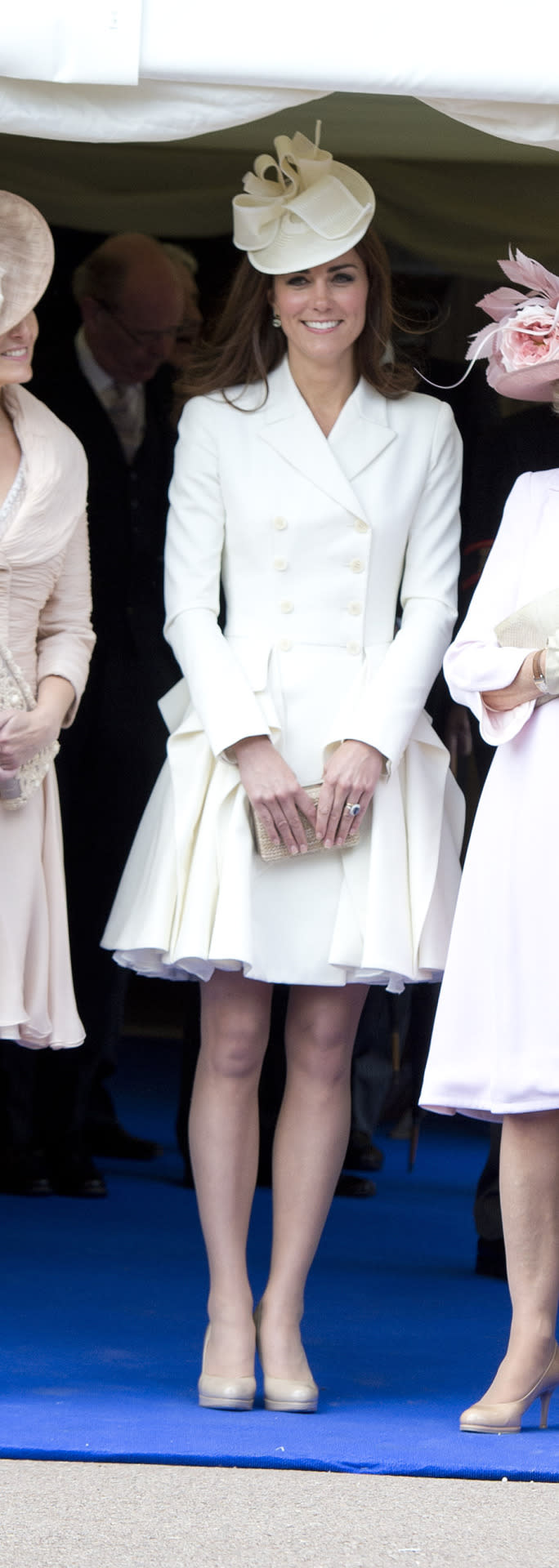 <p>Kate went for a white Alexander McQueen coat for the annual Order of the Garter service. She accessorised with nude pieces from L.K. Bennett and a chic white hat by Jane Corbett. </p><p><i>[Photo: PA]</i></p>