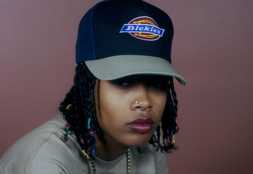 Rapper Da Brat (aka Shawntae Harris) appears in a portrait wearing a "Dickies" cap and a bling chain with her name on April 10, 1994 in New York City.