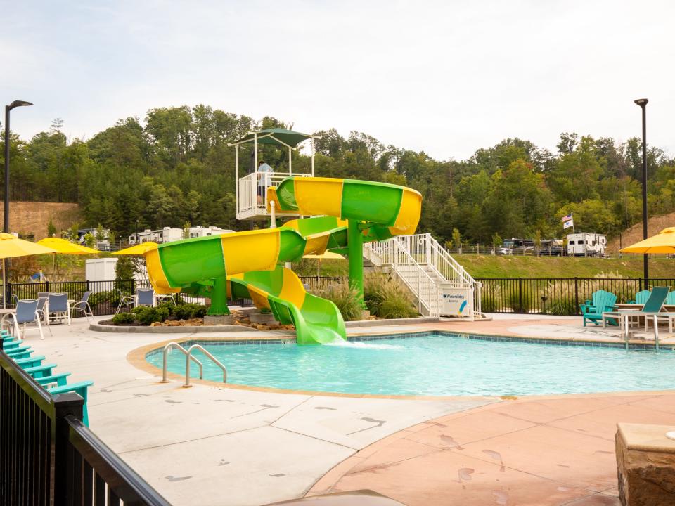 A pool with a slide at Camp Margaritaville Pigeon Forge