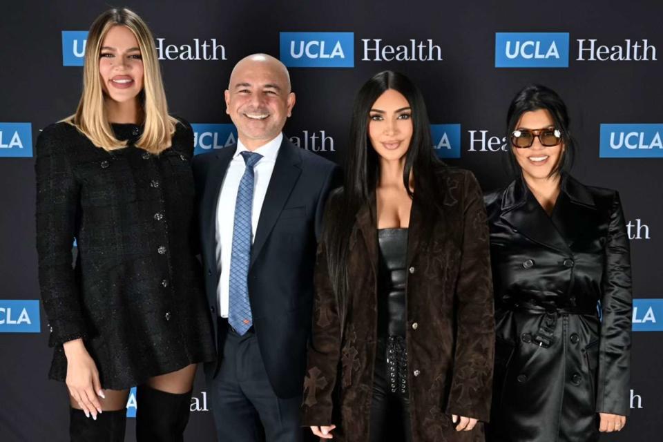 <p>John McCoy/UCLA Health</p> From left: Khloé Kardashian, Dr. Eric Esrailian, Kim Kardashian and Kourtney Kardashian