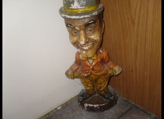 This figurine is an excellent example of when vintage, cute or kitschy just looks...old. Maybe he's holding out his pockets from being mugged. Cause this little guy sure looks beat up! *cue snare drum*    <a href="http://indianapolis.craigslist.org/atq/3147743784.html" target="_hplink">http://indianapolis.craigslist.org/atq/3147743784.html</a>