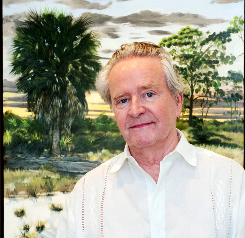 Paul Gervais stands in front of 'A Fallen Pine in the Scrub,' 2023 oil on linen, which is part of 'An Endangered Landscape; Recent Paintings of the Hypoluxo Scrub' exhibition at the Ann Norton Sculpture Gardens. The exhibit runs through Jan. 7.