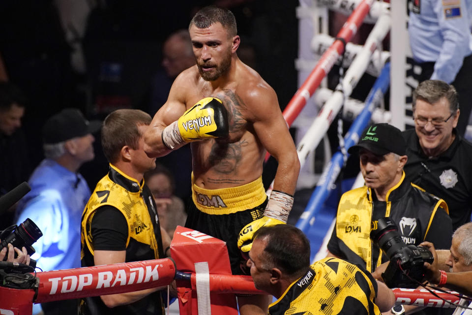 Vasiliy Lomachenko, of Ukraine, celebrates after defeating Masayoshi Nakatani, of Japan, by technical knockout during a lightweight bout Saturday, June 26, 2021, in Las Vegas. (AP Photo/John Locher)