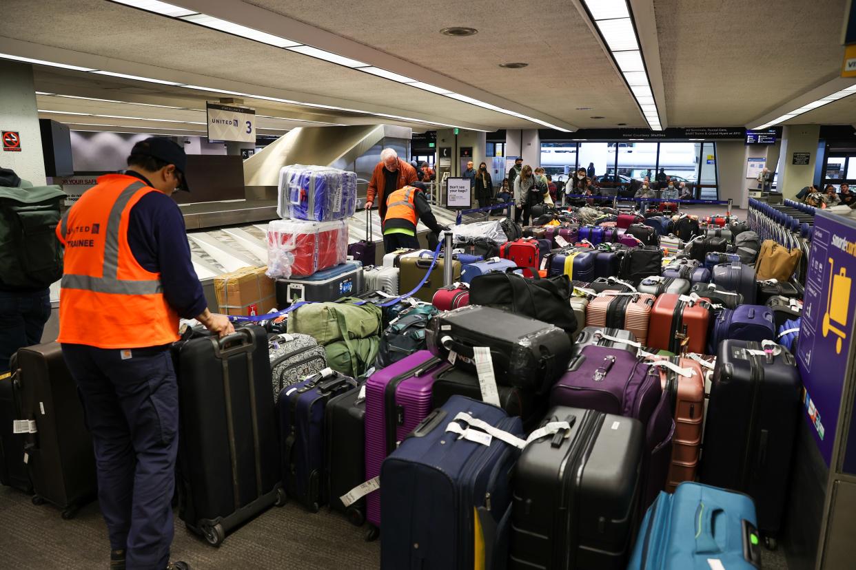 Hundreds of luggage are seen at San Francisco International Airport (SFO) due to airline cancellations, in San Francisco, California