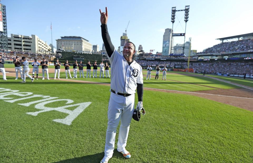 Detroit Tigers designated hitter Miguel Cabrera waves to fans after making his last play at first base as a Tigear during eighth inning action on Sunday, Oct. 1, 2023.