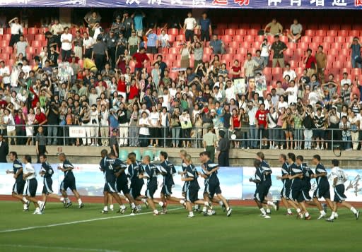 Real Madrid players training at Beijing Workers' stadium in August 2003