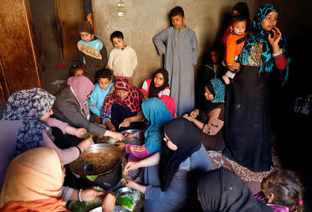 An Egyptian family prepares a cabbage meal for lunch in the province of Fayoum, southwest of Cairo, Egypt February 19, 2019. Picture taken February 19, 2019. REUTERS/Hayam Adel