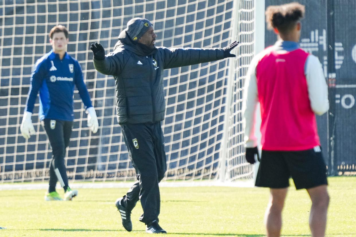 Crew coach Wilfried Nancy motions to his team during preseason training.