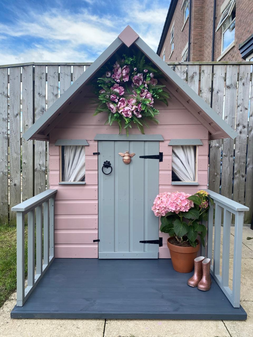 11. Upcycle a shed with pink and gray