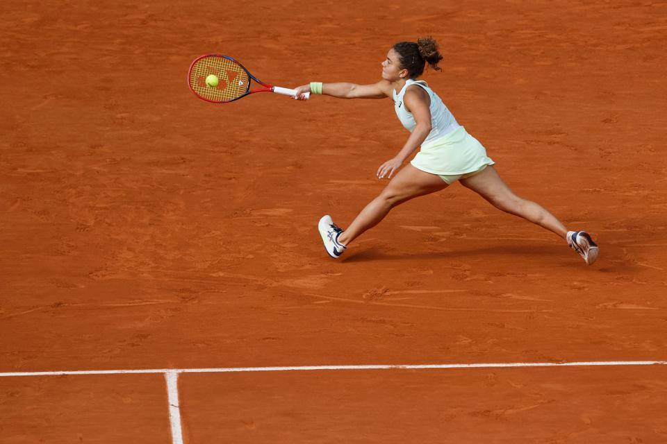 Italy's Jasmine Paolini plays a shot against Russia's Mirra Andreeva (AP)