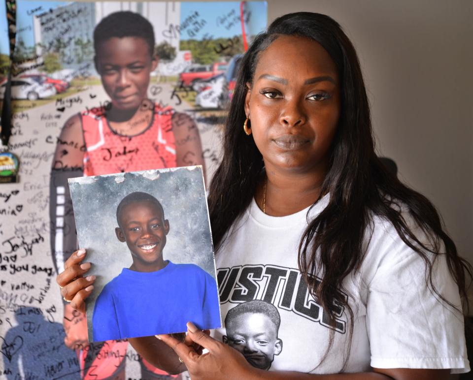 Chrisel Brown talks about her son Jeremiah Brown,14, who was shot and killed in "The Compound" on Christmas 2022. She is holding one of her favorite photos of her son.