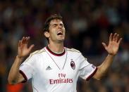 AC Milan's Kaka reacts after missing a chance to score against Barcelona during their Champions League soccer match at Nou Camp stadium in Barcelona November 6, 2013. REUTERS/Albert Gea (SPAIN - Tags: SPORT SOCCER)