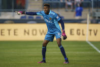 Philadelphia Union's Andre Blake directs his team during the first half of an MLS soccer match against the Columbus Crew, Wednesday, June 23, 2021, in Chester, Pa. (AP Photo/Chris Szagola)