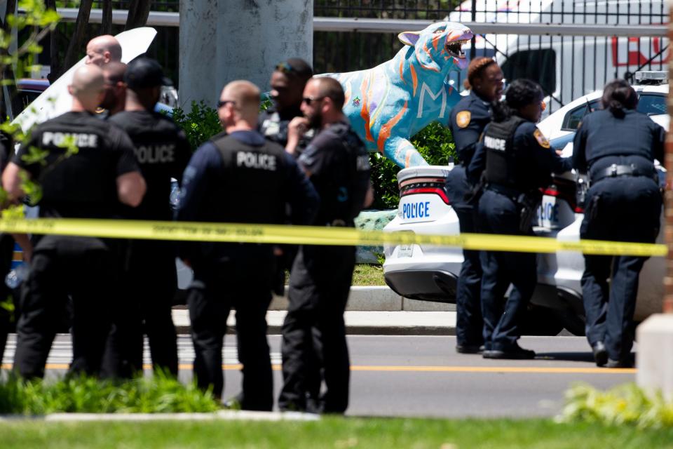 Memphis Police Department officers respond to an armed man at Ubee’s on Highland Street near the University of Memphis in Memphis, Tenn., on May 2, 2023. FOX13 News’ station, which is next to Ubee’s, reported that a bullet “fell outside the front door of the lobby,” when a shot was fired at the station. 