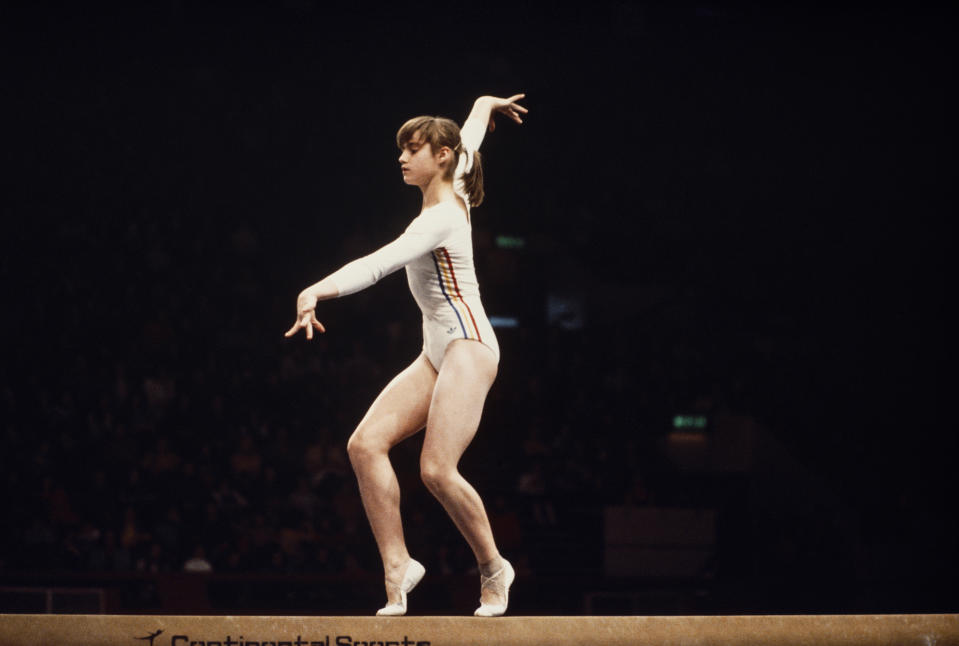 <p>At the 1976 Summer Games in Montreal, Romanian Nadia Comaneci won three gold medals and became the first female gymnast to receive a perfect 10 at an Olympics gymnastics event. (Getty) </p>