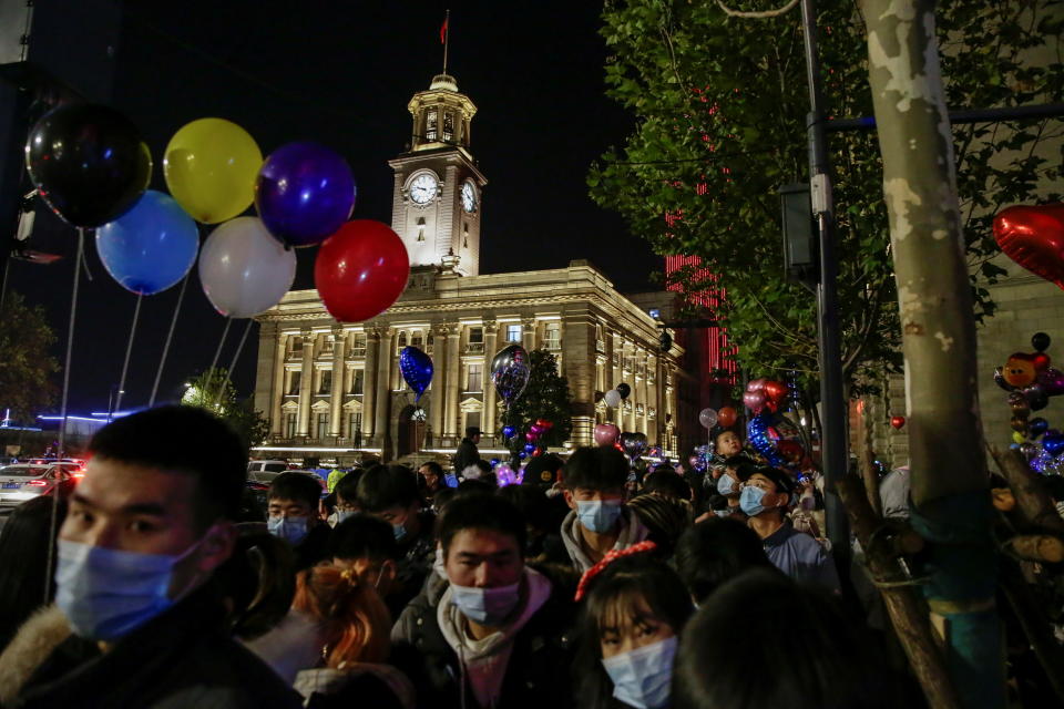 People gathering to celebrate new years in Wuhan. (Reuters)