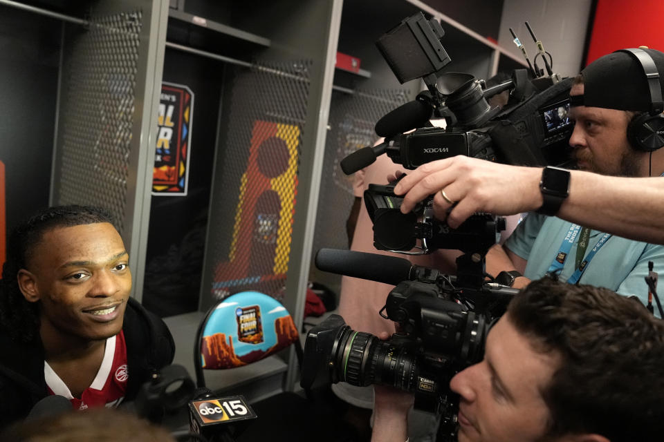 NC State guard DJ Horne speaks with reporters ahead of a Final Four college basketball game in the NCAA Tournament, Thursday, April 4, 2024, in Glendale, Ariz. NC State plays Purdue on Saturday. (AP Photo/Brynn Anderson )