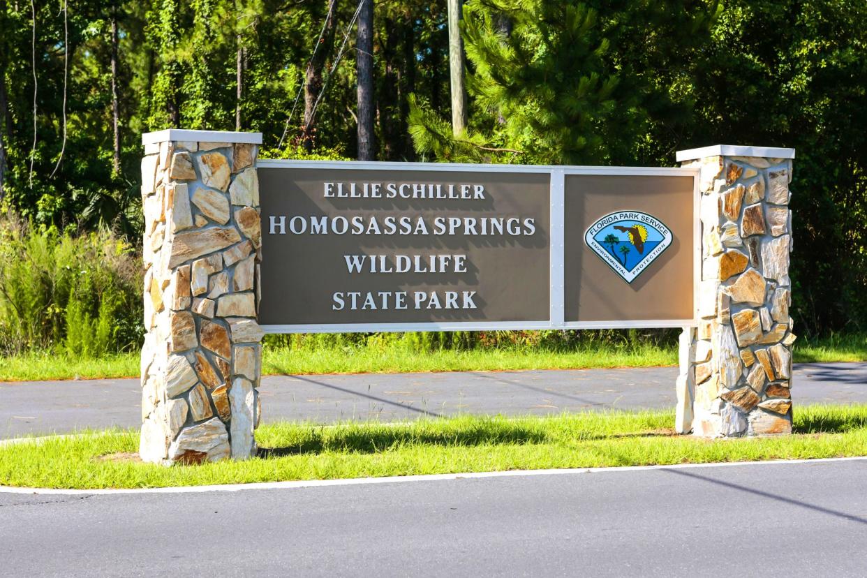 Homosassa, FL, USA - June 3rd, 2015: Official entrance brown and white with the Florida Park Service badge at the Ellie Schiller Homosassa Springs Wildlife State Park banner sign in Florida