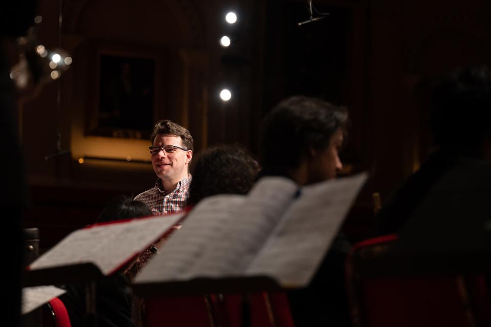 Jazz program director Dan Gabel talks to children during a dress rehearsal at Mechanics Hall.