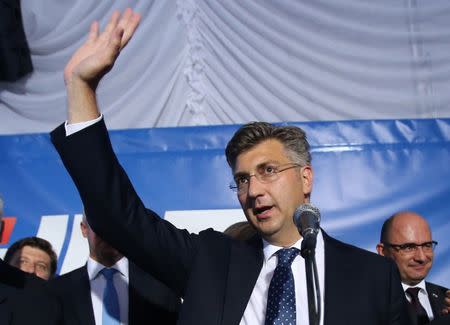 Andrej Plenkovic, president of the Croatian Democratic Union (HDZ), reacts during a speech after exit polls in Zagreb, Croatia, September 11, 2016. REUTERS/Antonio Bronic