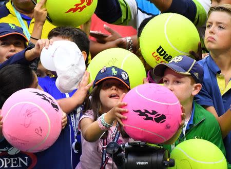 Sept 3, 2016; New York, NY, USA; Kids wait on Andy Murray for an autograph on day six of the 2016 U.S. Open tennis tournament at USTA Billie Jean King National Tennis Center. Mandatory Credit: Robert Deutsch-USA TODAY Sports