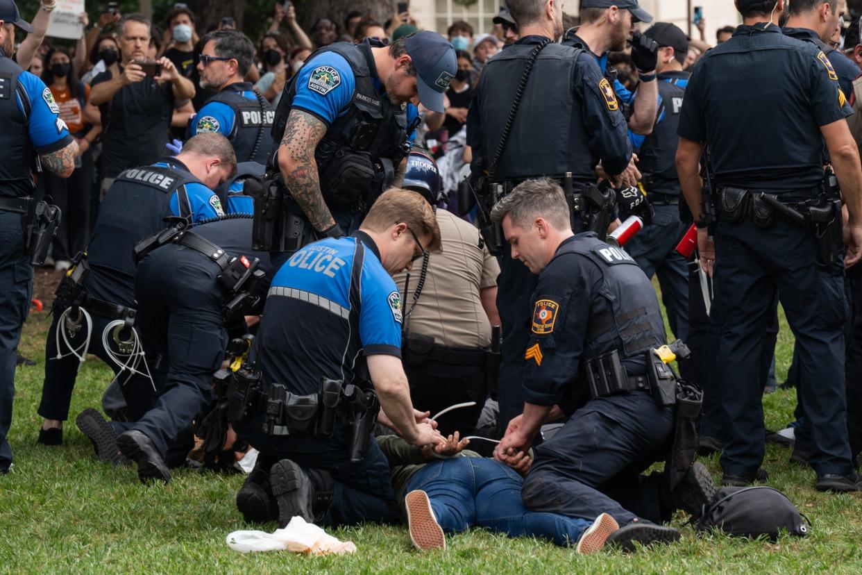 Protesters are arrested by Austin and University of Texas police at a pro-Palestinian protest at the University of Texas Wednesday April 24, 2024.