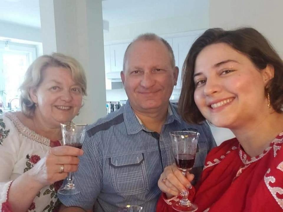 Anastasia Gromova with her parents on Orthodox Easter this year. She ordered a dress from Ukraine and cooked traditional food for her family.