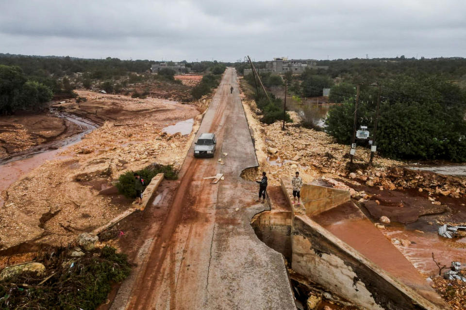 A damaged road after a powerful storm and heavy rainfall hit Shahhat, Libya, on Sept. 11, 2023. (Ali Al-Saadi / Reuters)